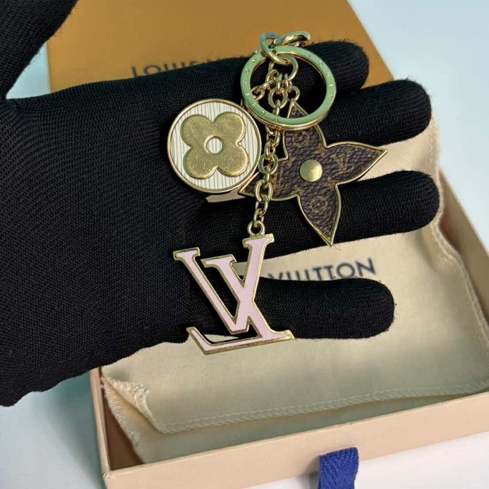 Louis Vuitton Gold and Brown Monogram Key Holder/Bag charm